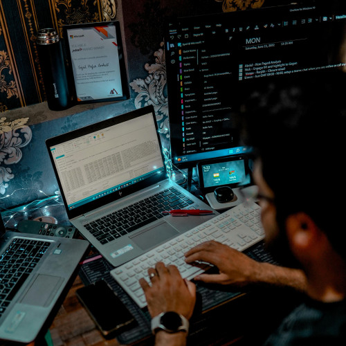 Man programming on a computer